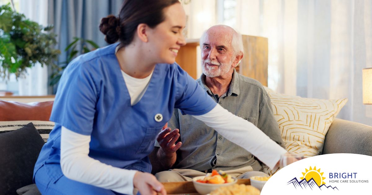 Caregiver providing senior care at home to manage parkinson’s and related symptoms.