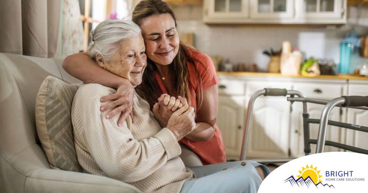 Caregiver supporting an elderly woman in the transition to senior home care